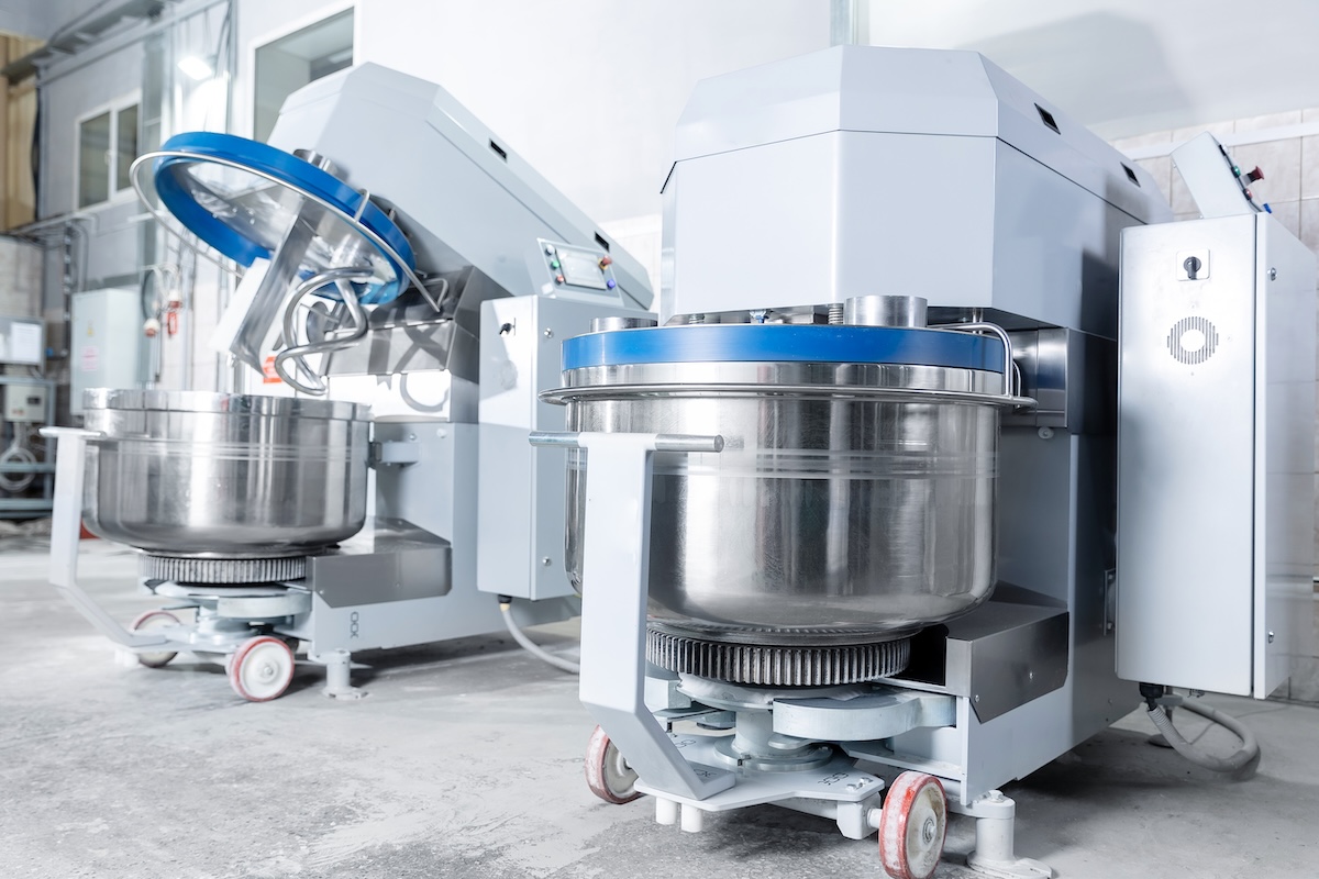 Industrial dough mixing machines powered by fully sealed, food grade lubricated right angle gears.